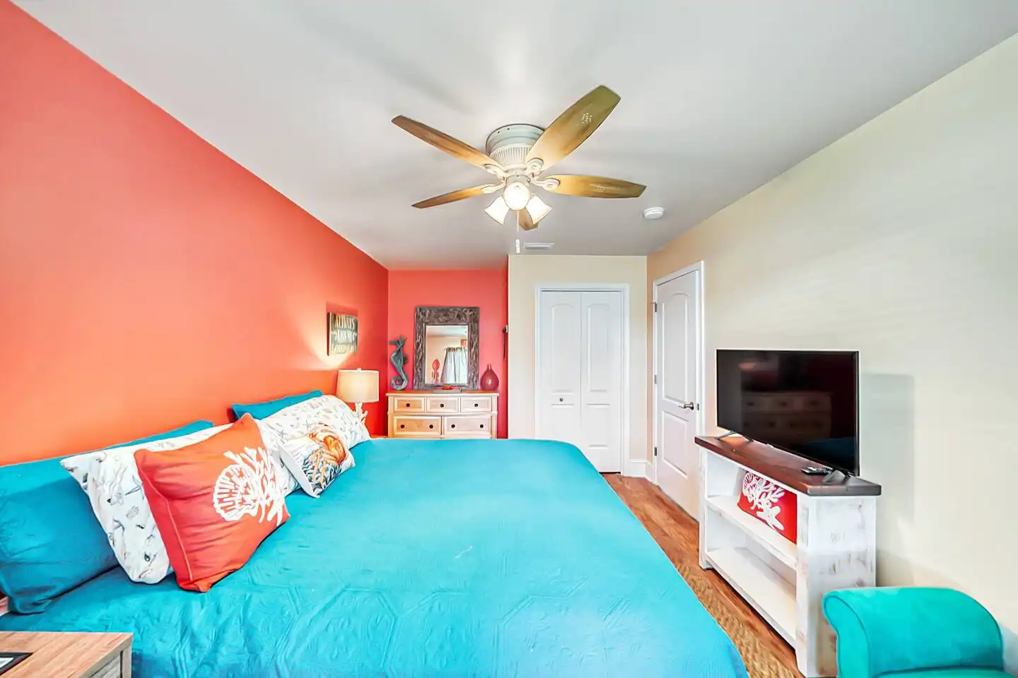 Bedroom #1, with king bed, desk and monitor, Roku TV, dresser and closet. Bedroom #1, with king bed, desk and monitor, Roku TV, dresser and closet. - The Curvy Palm - Panama City Beach