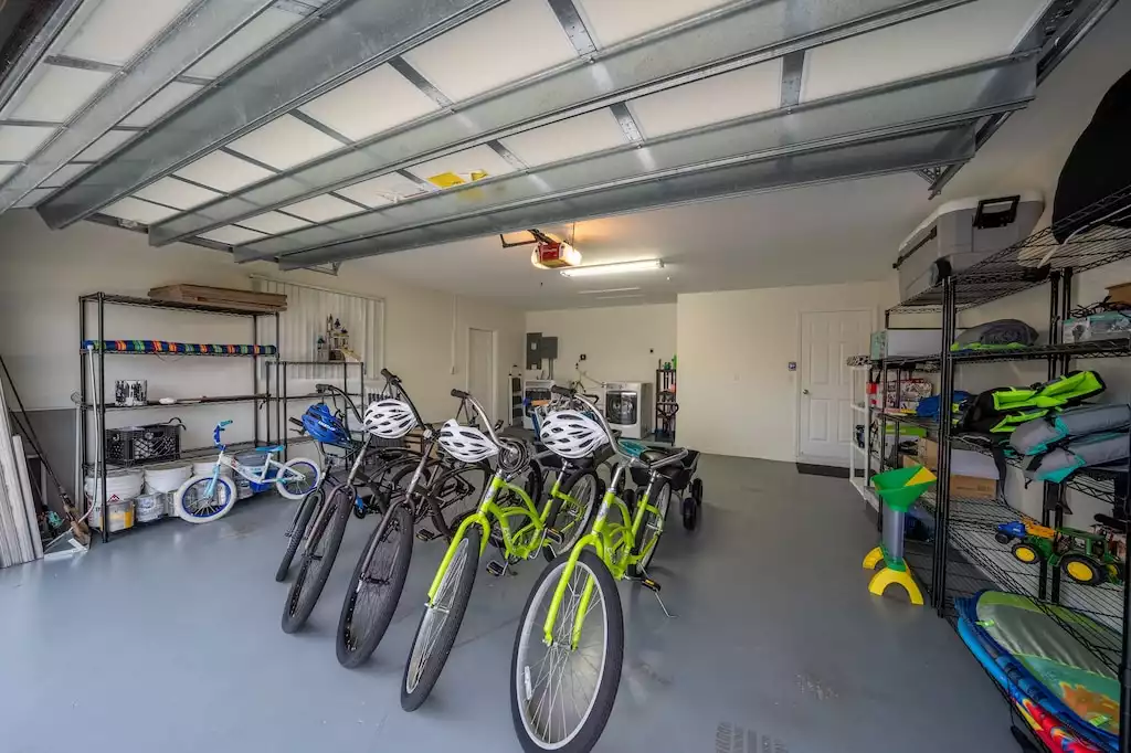 Garage with bikes and beach equipment