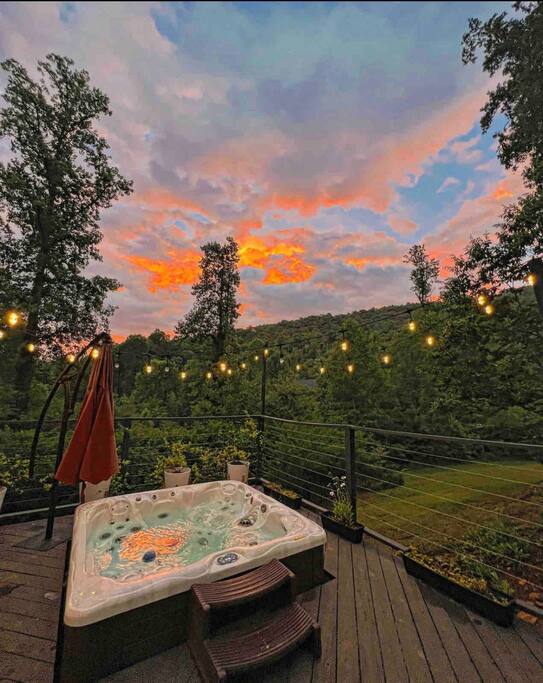 Lower cabin- sunset view from hot tub Lower cabin- sunset view from hot tub - CAPER Camp! 2 cabins on 3 acres. Sleeps 14! - Clayton
