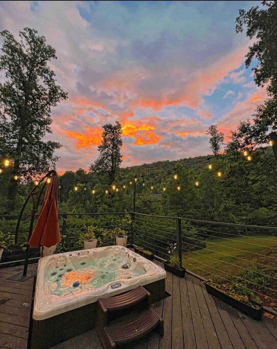 Lower cabin- sunset view from hot tub - CAPER Camp! 2 cabins on 3 acres. Sleeps 14! - Clayton