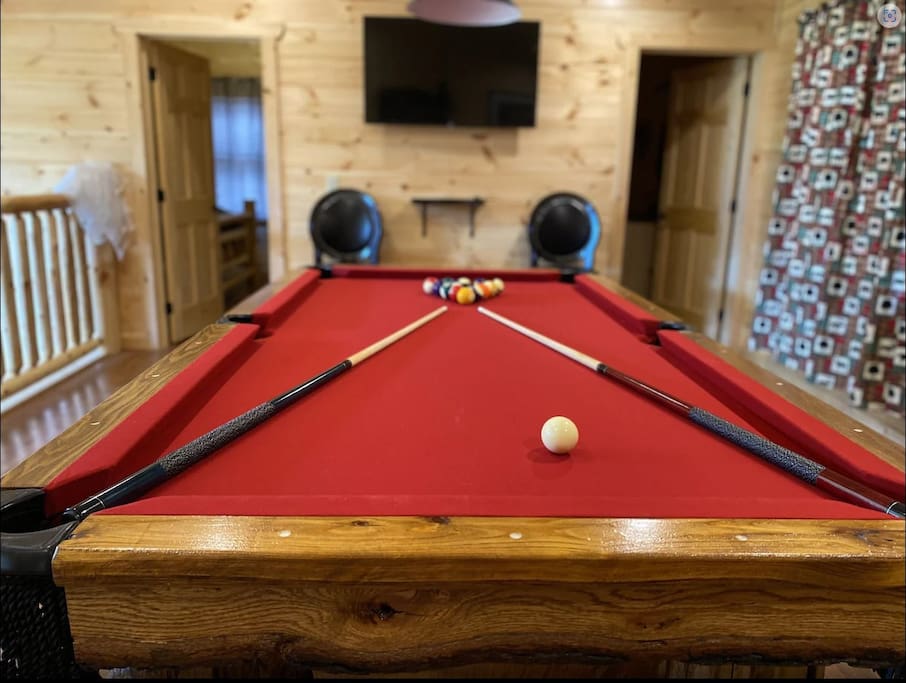 Pool Table with 50" TV in the Background