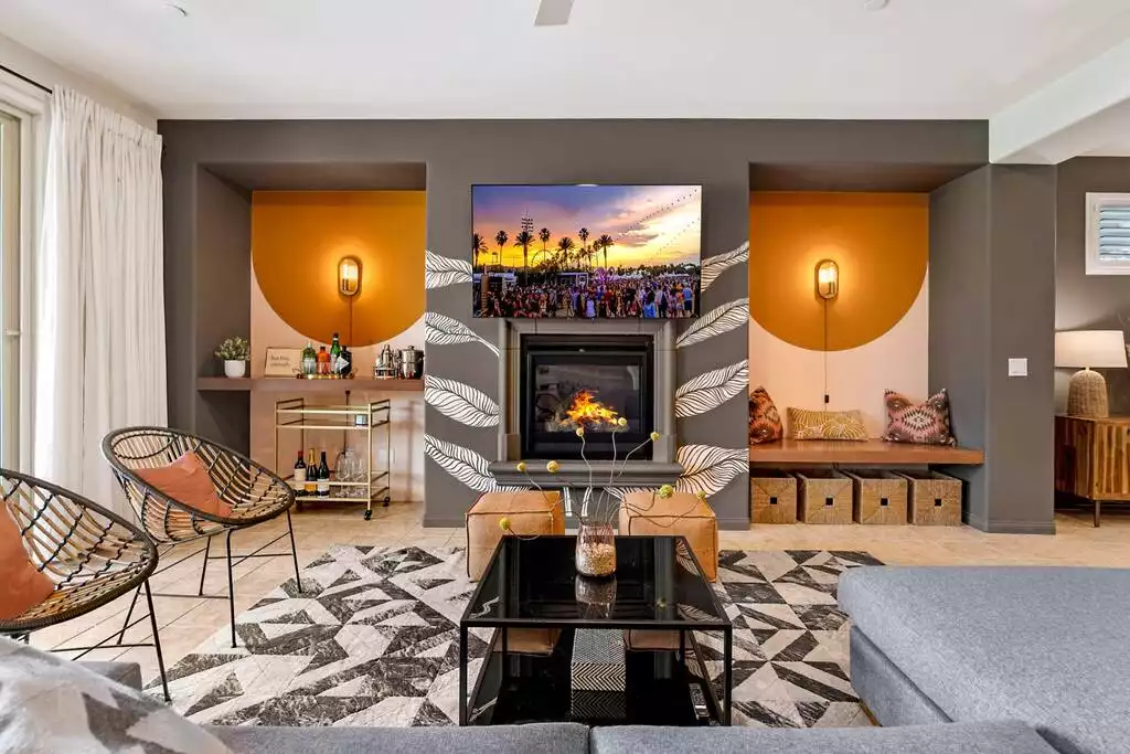 Living room features custom cabinetry and 65" Sony Bravia OLED 4K TV