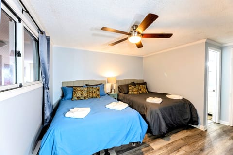 Two full beds (primary bedroom)
