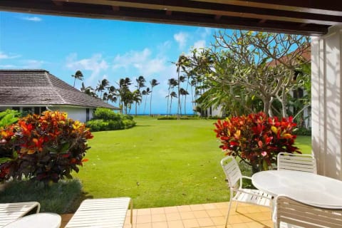 Soak in the ocean view and the sound of the waves on your private lanai.