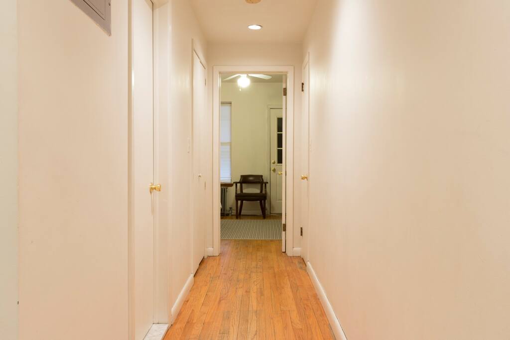 Hallway to bedroom - Historic Townhouse with Private Backyard - New York