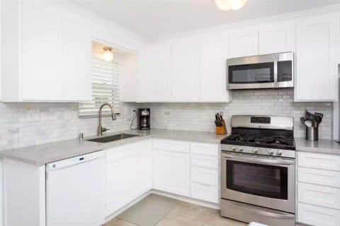 Kitchen with Dishwasher and Laundry Washer/Dryer in unit (*Note: Coffee maker in photo has been replaced with K-Cup machine)