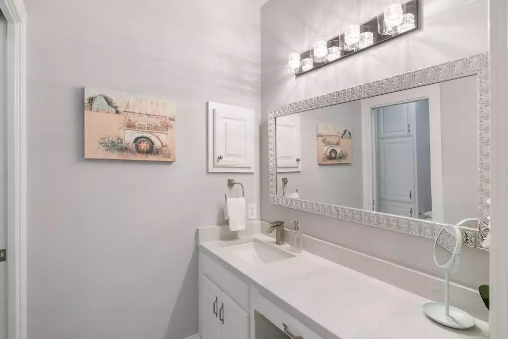 Separate vanities with plenty of counterspace. Bathroom #4 Jack & JIll - Main House at Whispering Oaks Estate - Dripping Springs