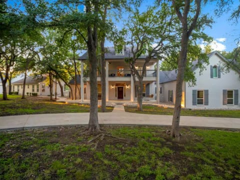 Tree lined entrance to The Whispering Oaks Estate.