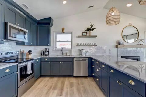 Don't feel like going out to eat with your large group? Cook in our updated fully stocked kitchen containing cookware, crockpot, blender, toaster, griddle, and serve it on our large peninsula.