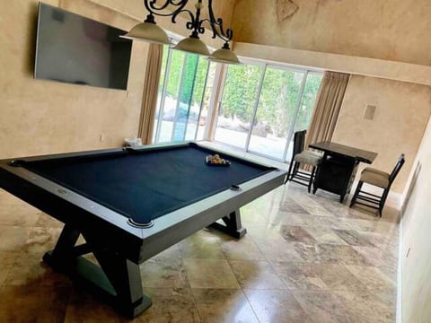 Pool table / Gameroom with 65 inch Sony tv and surround sound.