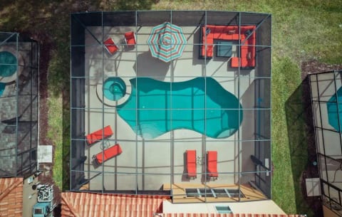 Aerial view of pool and furniture