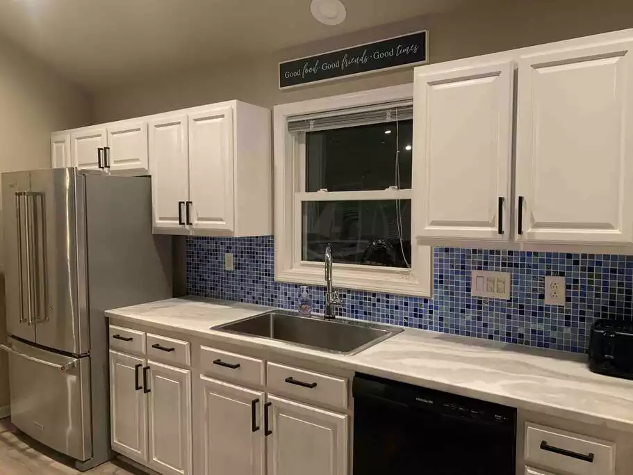 New tile backsplash, new sink and faucet, new fridge, new counters, new cabinet color and hardware, new dishwasher. - Destination-OBX 8 Bdrm, 6 Bath Semi-Ocean Front - Nags Head