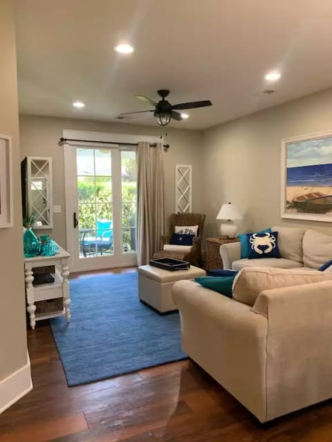 Living room overlooking private outdoor patio