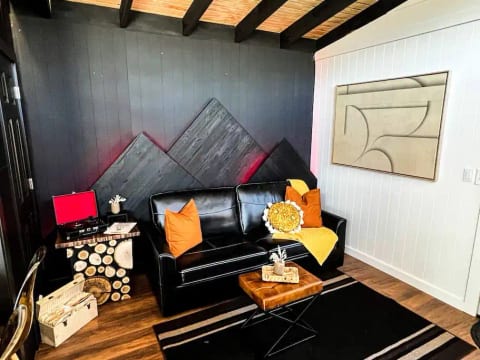 Leather couch pulls out into a queen size sleeper.