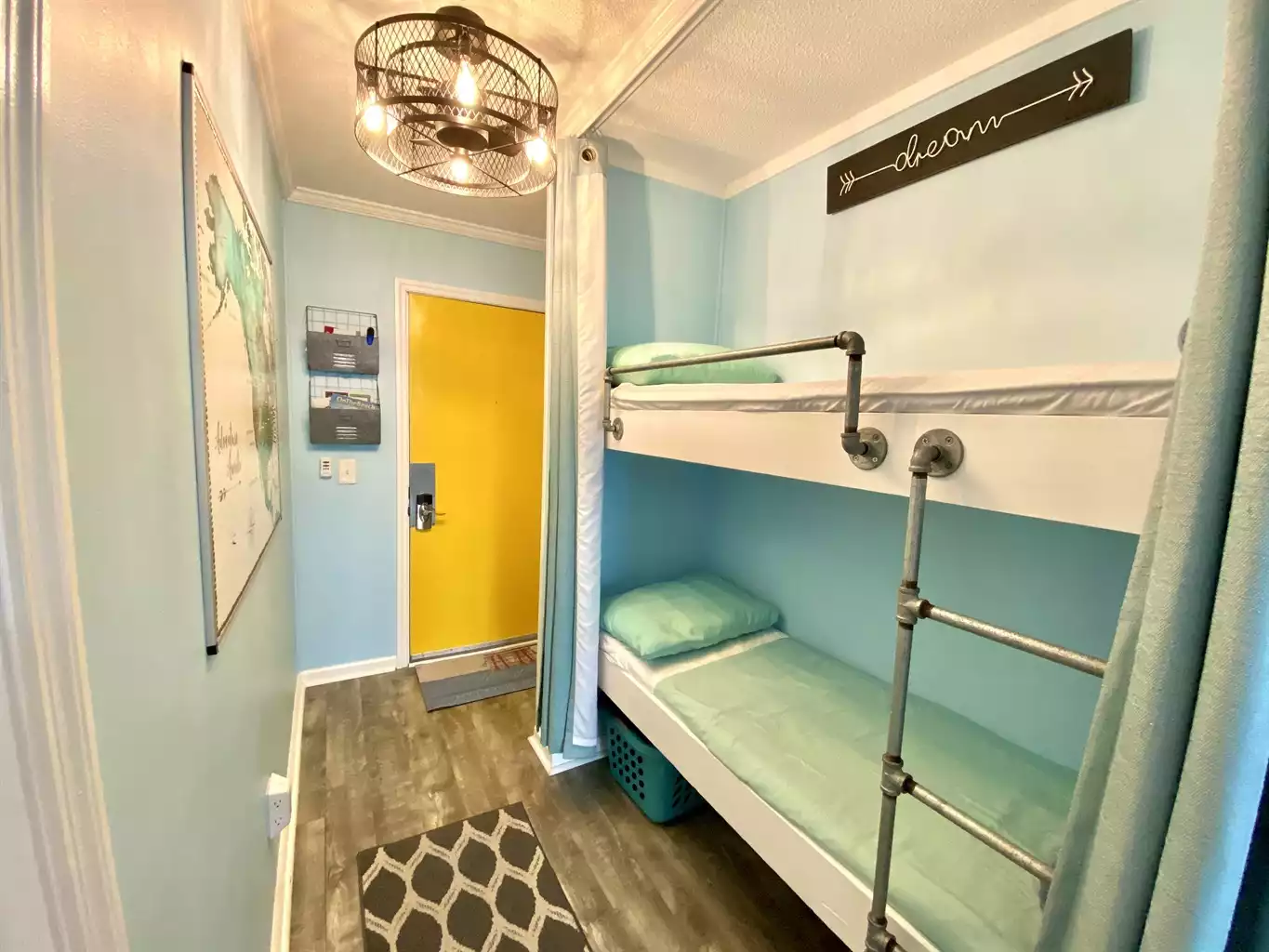 A view of the foyer/bunk area. Has a ceiling fan and storage under the bunks for luggage A view of the foyer/bunk area. Has a ceiling fan and storage under the bunks for luggage - Sunrise Shores - Myrtle Beach
