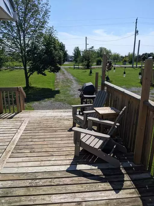 View of driveway from deck. - Family Friendly Suite with Arcade and Park Pass - Prince Edward