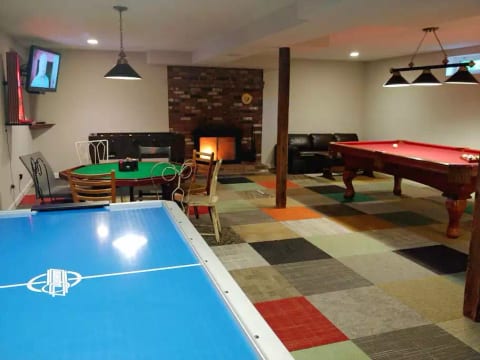 game room - fireplace, flat screen tv, ping pong, pool table, air hockey, foosball, poker table, boss toss, sauna
