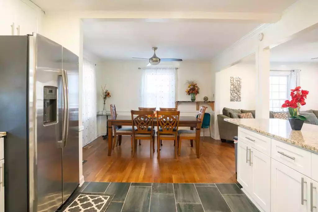 Dining room attached to kitchen - Cheerful Family-Friendly Home: Ample Outdoor Space - Raleigh