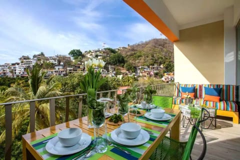 Enjoy spectacular views across the Rio Cuale towards Gringo Gulch and Banderas Bay