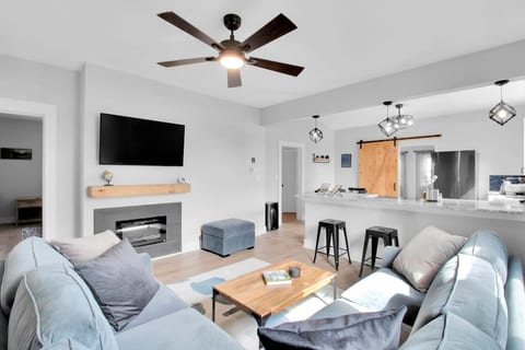 Fully renovated home with brand new everything! Enjoy sitting on the comfortable couch while watching the 50" TV with a fire blazing. TV has a ROKU with standard Cable service, or connect to your favorite streaming apps with your own log in.
