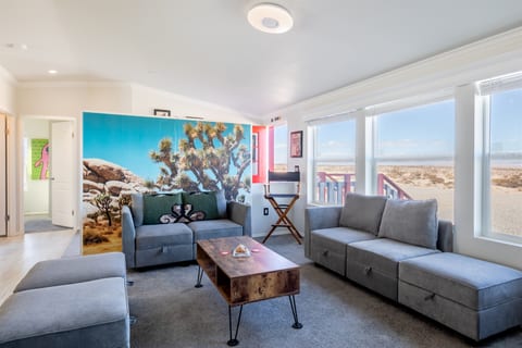 Comfy living area with large windows