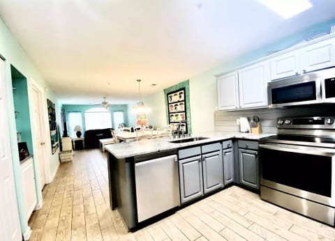 Kitchen open to living and dining rooms