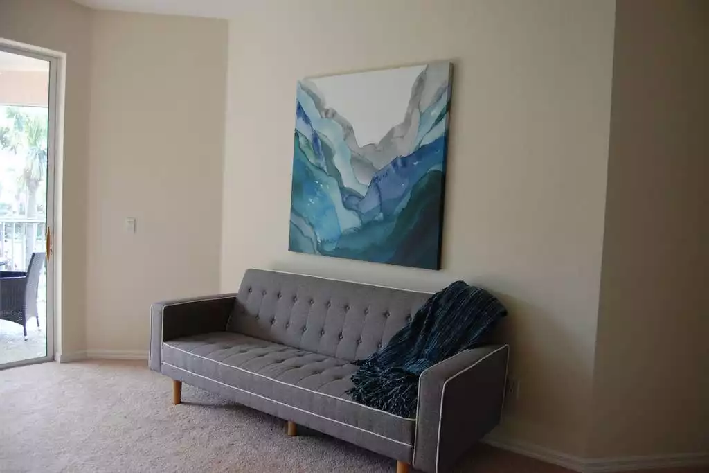 This couch folds down for extra sleeping space as a futon.