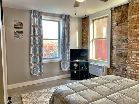 Exposed brick, heat and A/C unit exclusive to your unit, smart TV, room darkening curtains