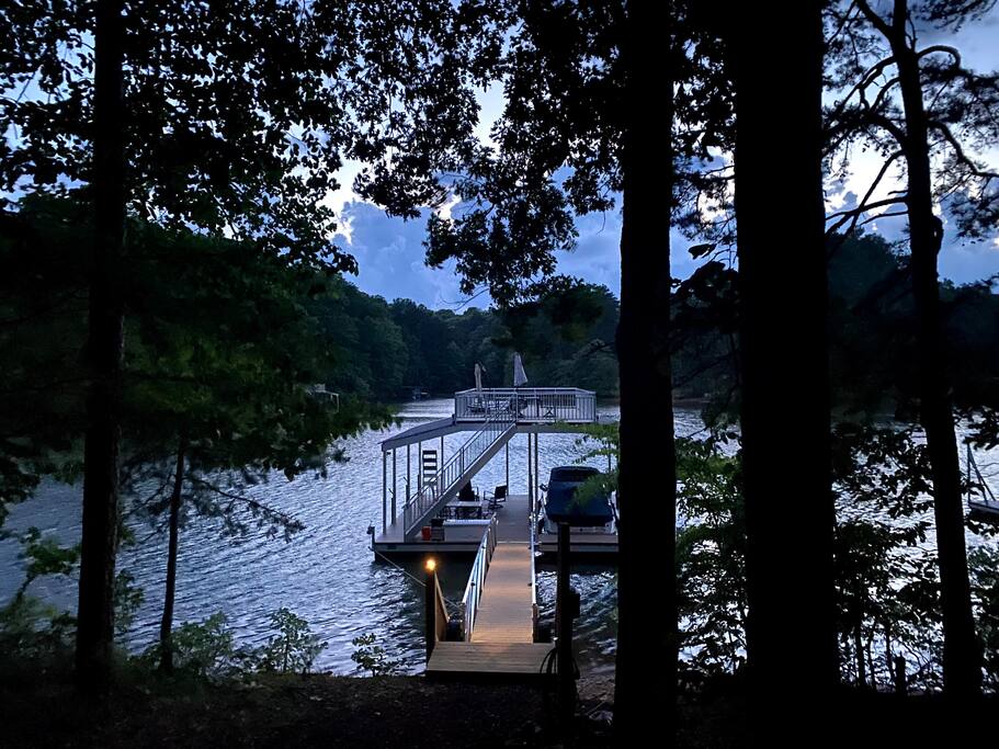 Watch some of the most beautifully sunrises or sunsets comfortably on the dock with high end patio furniture. - Luxury Cabin with Dock & Hot Tub - Gainesville