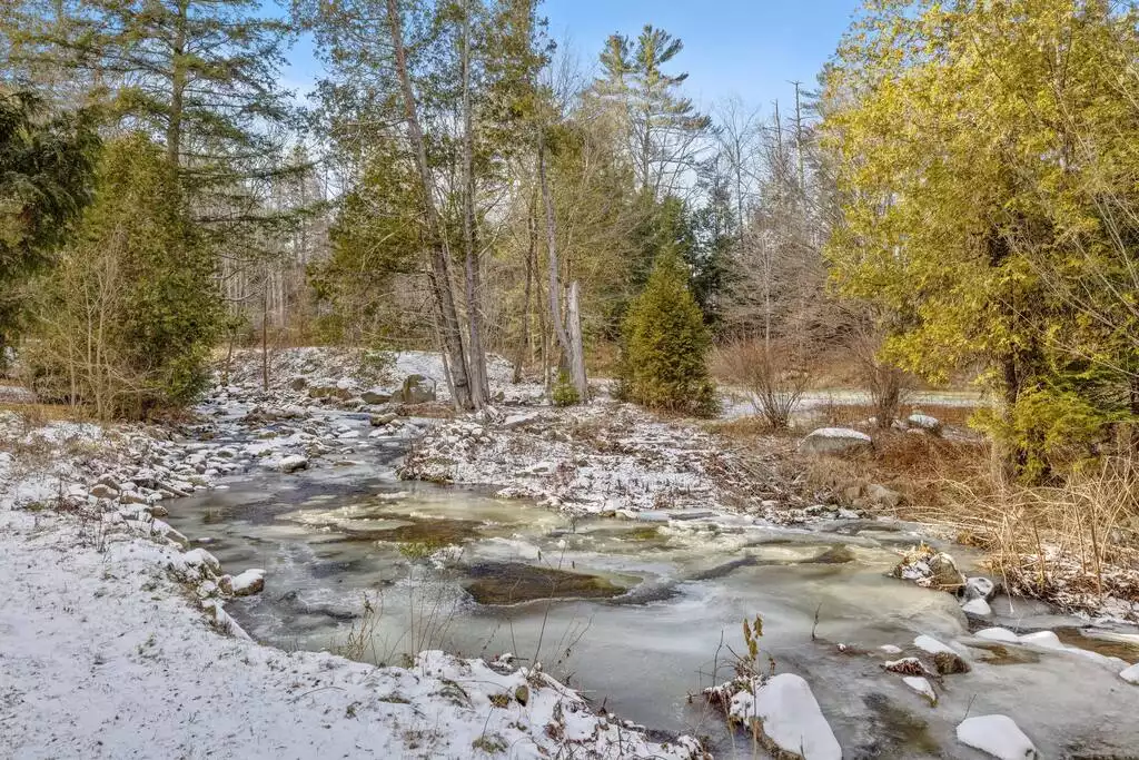 The Connor Brook partly frozen over - Connor Brook Farm - Campton