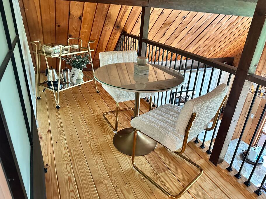 Cozy loft setup overlooking the wall of windows and tree line views. - Mountain Sunset Retreat - Jasper