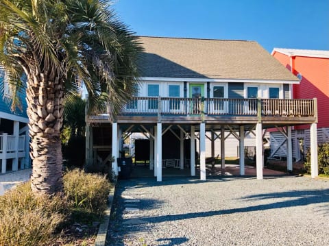 Second row home just across the street from private beach access