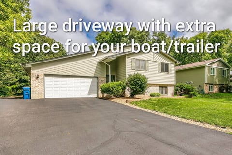 Front yard, huge driveway with extra parking spaces