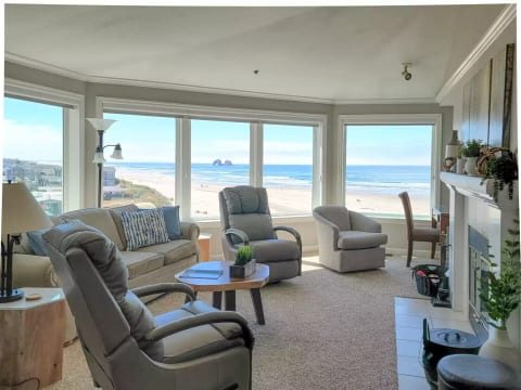 Living Room with panoramic views of the Pacific Ocean and downtown Rockaway Beach, overlooking the wayside.
