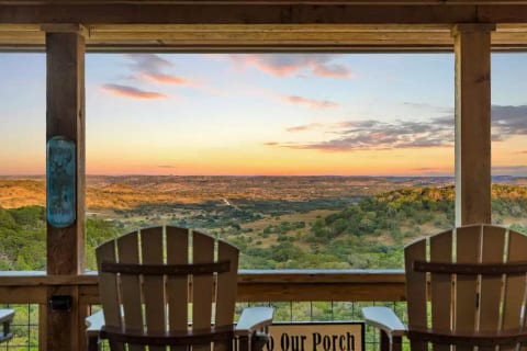 This view can not be captured in a picture!  The view is absolutely AMAZING!  Relax on our covered porch in the most comfortable polywood glider chairs and take in the morning sunrise.  You won't be disappointed!