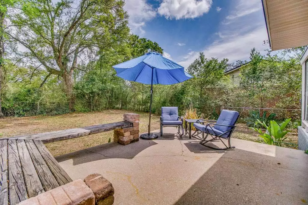 Step out of the living room onto the patio to enjoy your morning coffee! - Escape to Five Flags Retreat, Pensacola - Pensacola