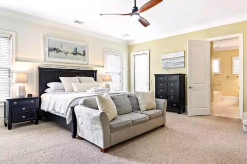 Main Level King Bedroom, fresh duvet cover, smart TV, private bathroom