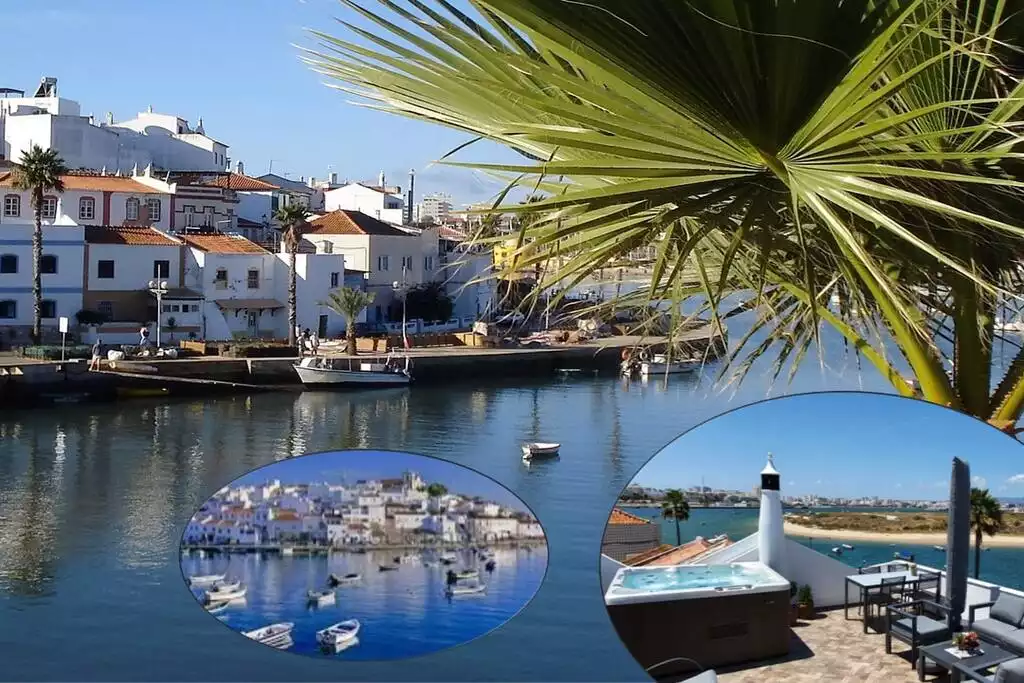 Our house is to the left behind the palm, white with two blue stripes. Right in the heart of the the historical part of Ferragudo - Waterfront, big terrace, hot tub, 200 m to beach - Ferragudo