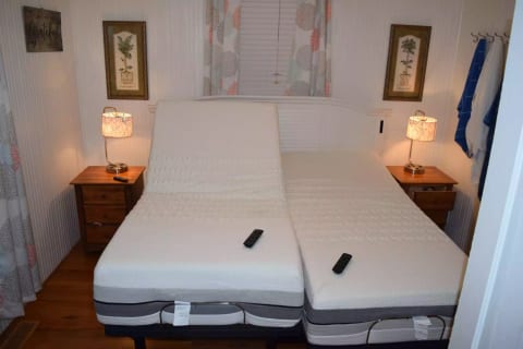 Adjustable Split King bed. Raise the head or the feet independent of your partner's side. Three levels of vibration are also available. Download the app to control with your phone.
