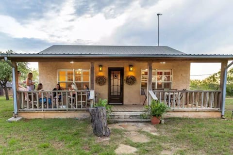 Get away with your friends and hang out on the expansive front porch.