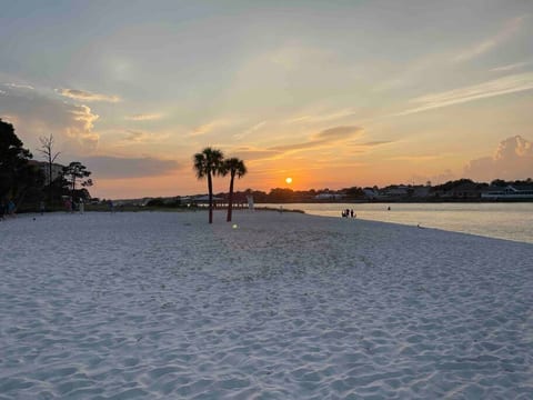 A beautiful sunset on the private beach just step away on the paved walkway. Have a cup of coffee on the beach in the morning or you favorite adult beverage in the evening..