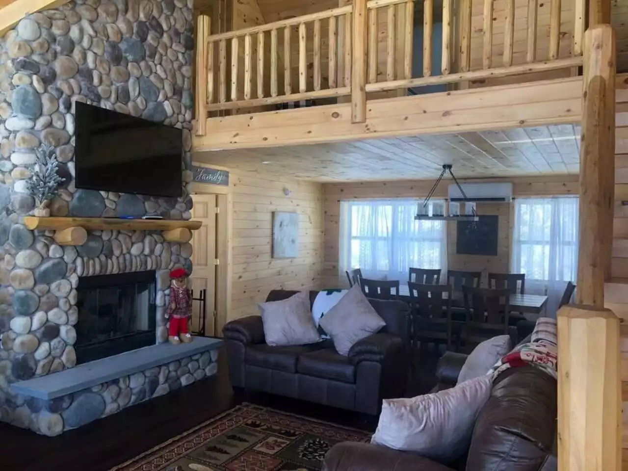 Living room with loft above Living room with loft above - Lake Eugene New 5 BR 2.5BA LogHome Lakefront - South Kortright