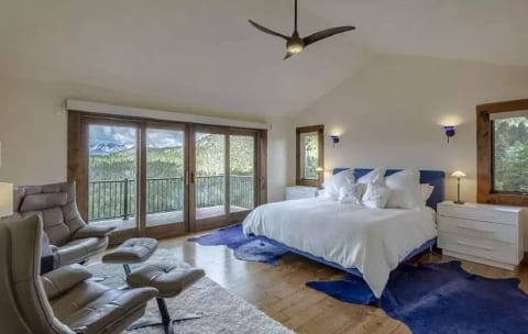 The master bedroom is a perfect private retreat after your day's adventures.