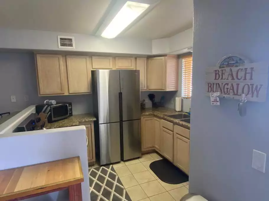 New refrigerator with plenty of space! Fully stocked kitchen to cook in the unit without going out to eat. - Boater’s Paradise, Kingsview 4th floor, on Lake! - Lake Havasu City