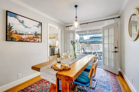 Dining room with antique French table, seats 6 for lively meal time conversation.