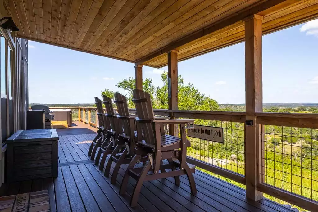 New gliders chairs on porch with a view. Two additional gliders coming soon. - GWR-Private-AmazingHilltopView-HotTub-FirePit-Pool - Fredericksburg