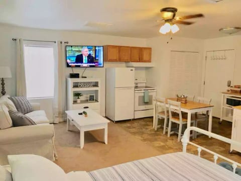 View from the bed. We have a ceiling fan and a box fan available. Window A/C is provided during the summer months.