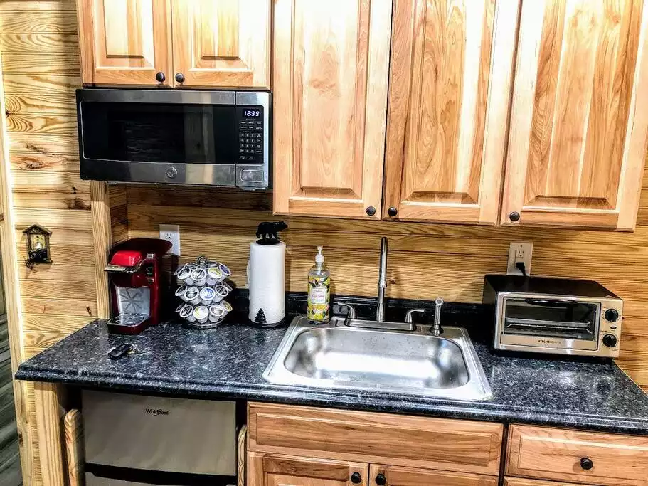 Perfect 2nd kitchen for picnic prep & coffee station to re-up your energy! You'll find a hot plate and various picnic items here for your convenience. Walk right out to the grill & picnic tables. Perfect 2nd kitchen for picnic prep & coffee station to re-up your energy! You'll find a hot plate and various picnic items here for your convenience. Walk right out to the grill & picnic tables. - The Blue Ridge Cabin - Roseland