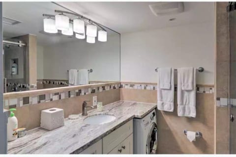 1st floor full bathroom with washing machine.