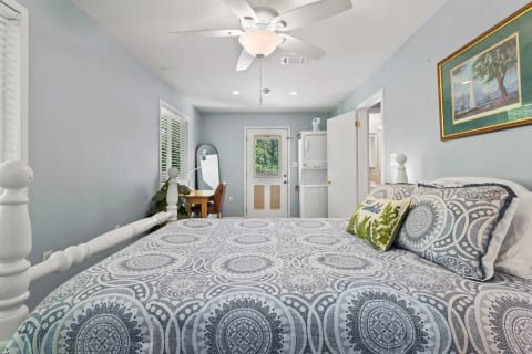 Master bedroom with dedicated work space and laundry